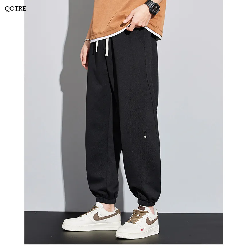 Drawstring Knitted Solid Color Tapered Loose Fit Sweatpant